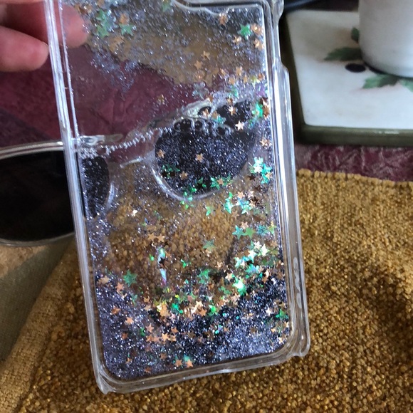 iPhone floating sparkles and clear sunglasses 😎 - Picture 1 of 4